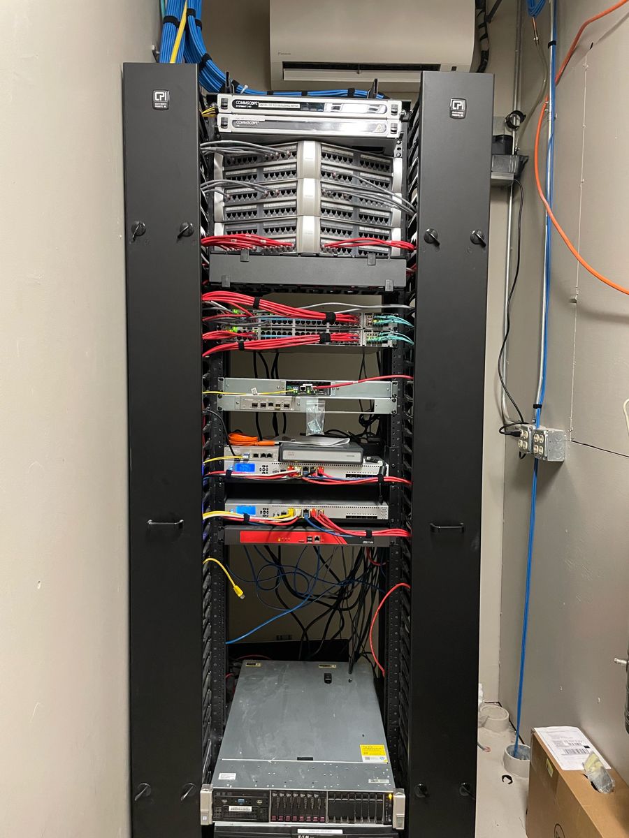 Network rack with patch panels and switches